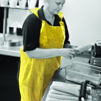 Yellow LDPE apron on a roll 16 micron